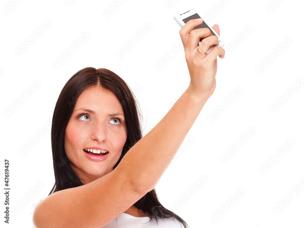 Young woman takes photos using her mobile phone Young woman takes photos using her mobile phone