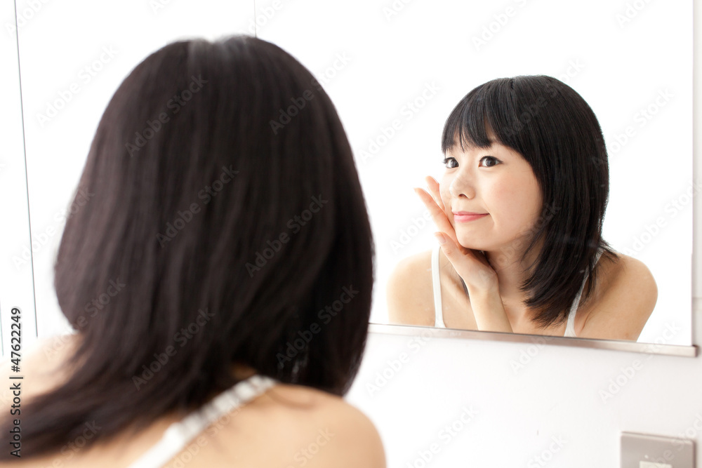 attractive asian woman making up attractive asian woman making up