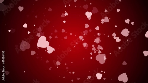 Hearts are falling against a red background.