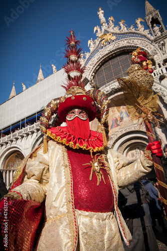 Mask in San Marco square during carnival of Venice