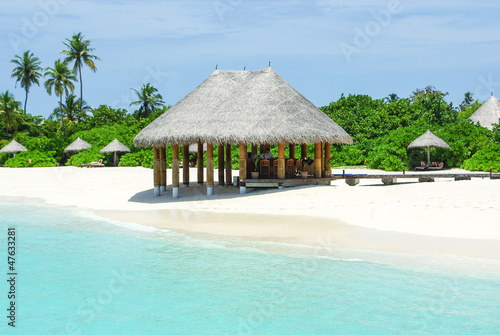 Beautiful beach with white sand and bar on Maldives