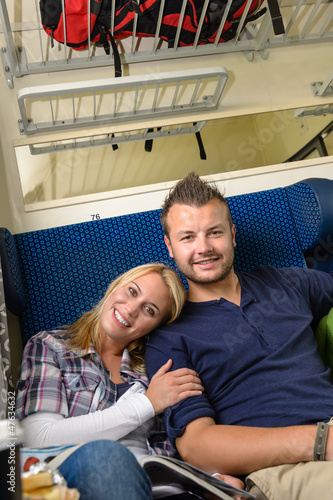 Woman leaning on man s shoulder in train