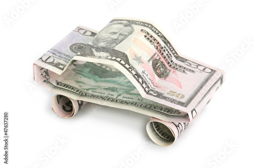 car made from dollar isolated on white background