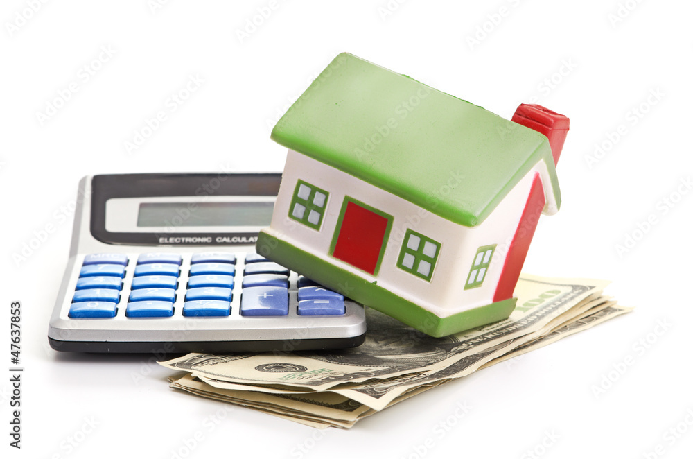 house sitting with a calculator and dollar