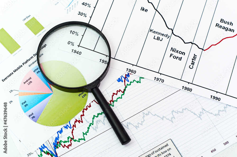 magnifying glass on graph business search