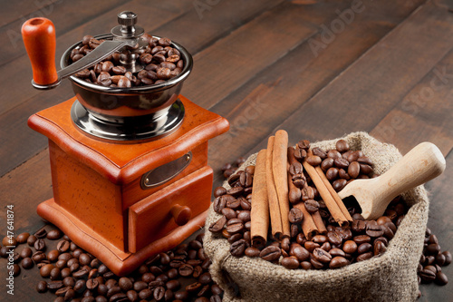 coffee grinder and sack with coffee beans