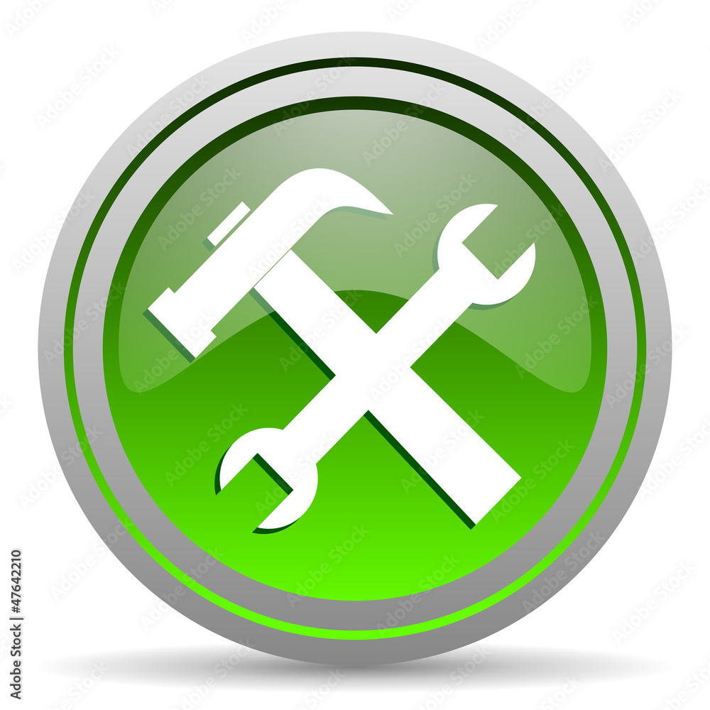 tools green glossy icon on white background tools green glossy icon on white background