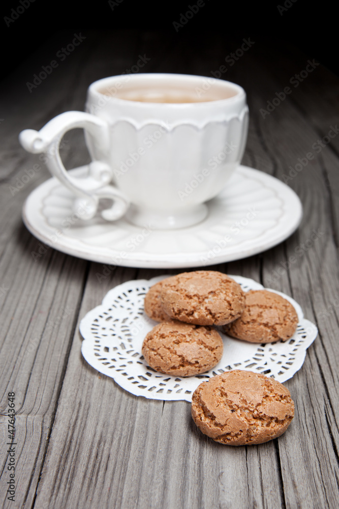 Cup of tea and cookies on wooden background Cup of tea and cookies on wooden background