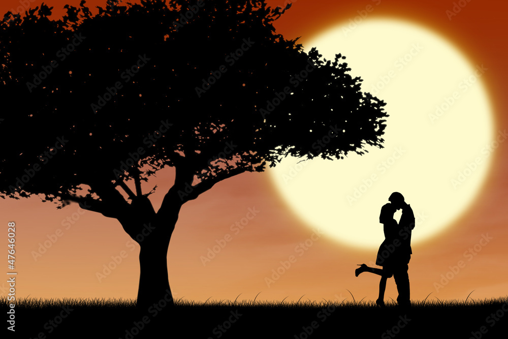 Couple kissing by orange silhouette and tree Couple kissing by orange silhouette and tree