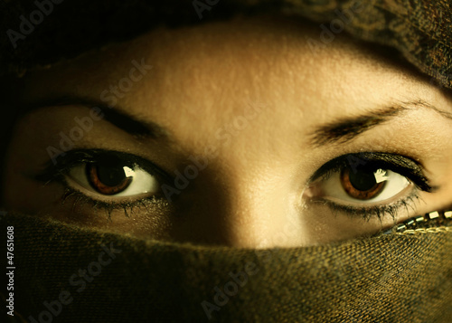 beautiful eyes of eastern woman in paranja photo