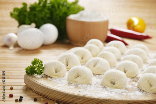 Meat dumplings on the kitchen board