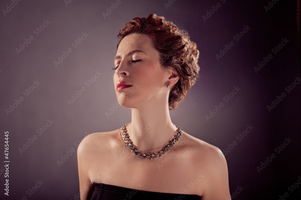 elegant mature woman in black tight dress and red curly hair Stock Photo |  Adobe Stock