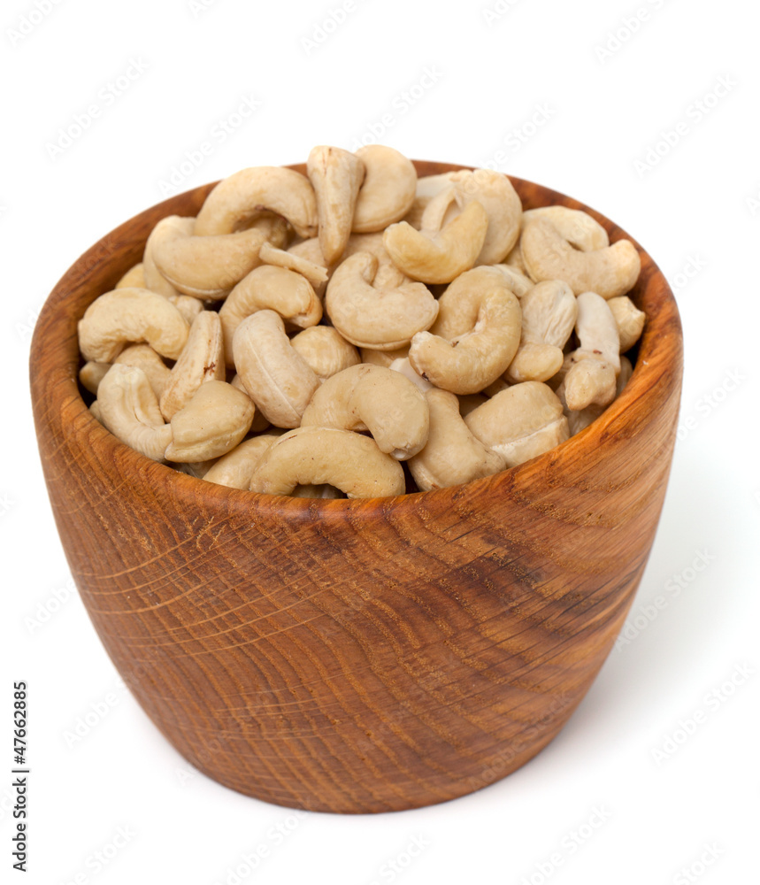 cashew nuts in a bowl isolated on white background cashew nuts in a bowl isolated on white background