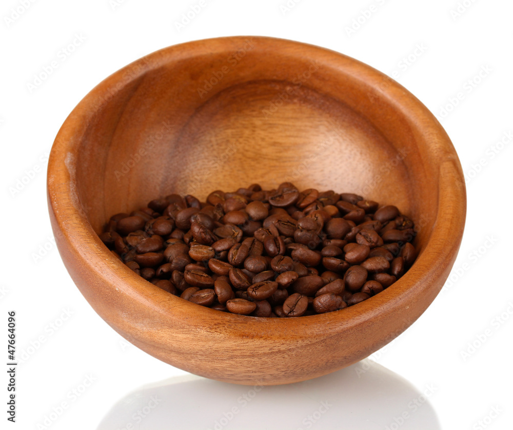 Coffee beans in wooden bowl isolated on white Coffee beans in wooden bowl isolated on white