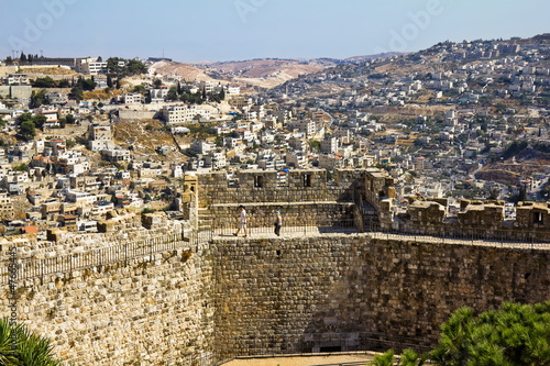 View from the walls of ancient Jerusalem  to city rooftops photo