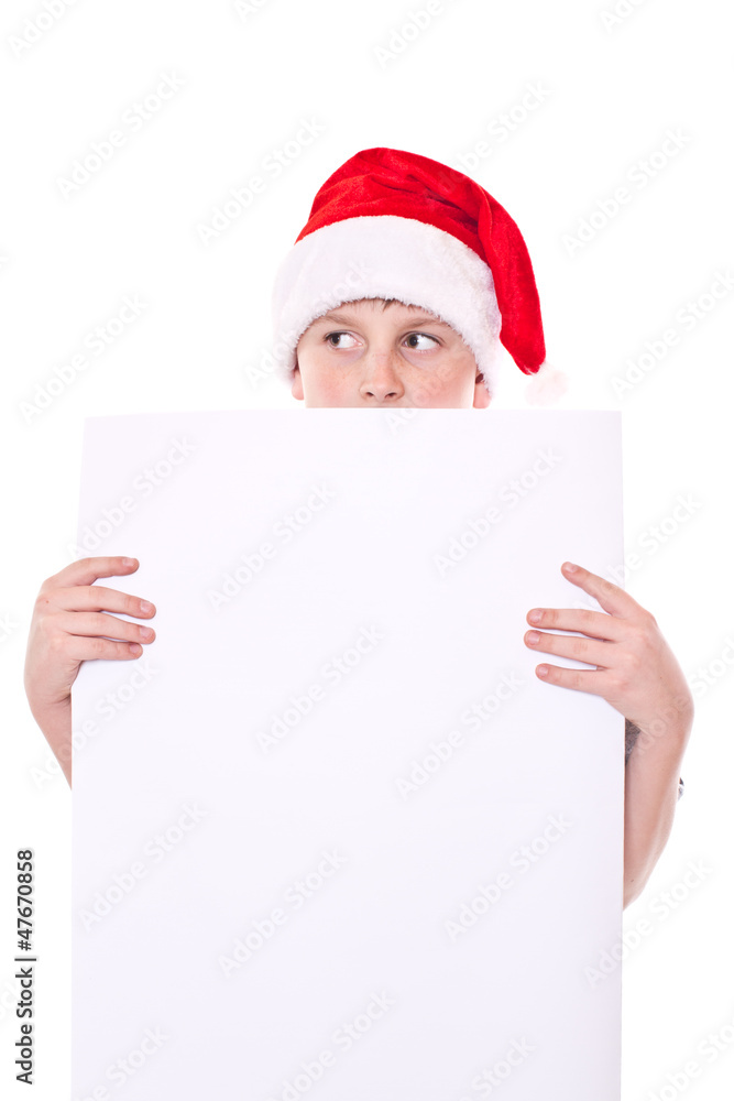 boy in the Christmas hat with a blank boy in the Christmas hat with a blank