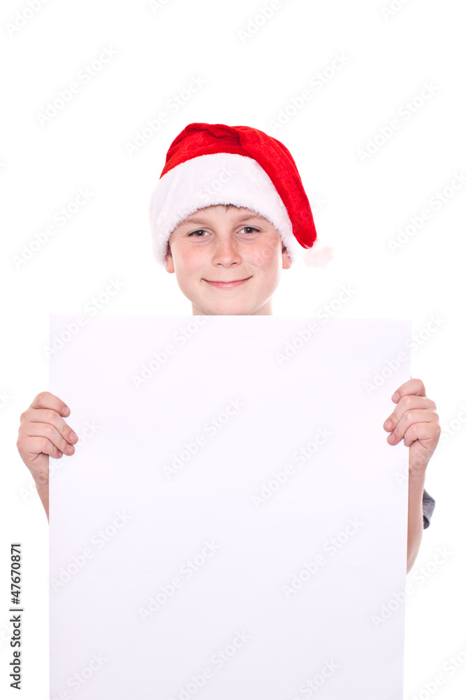 boy in the Christmas hat with a blank boy in the Christmas hat with a blank