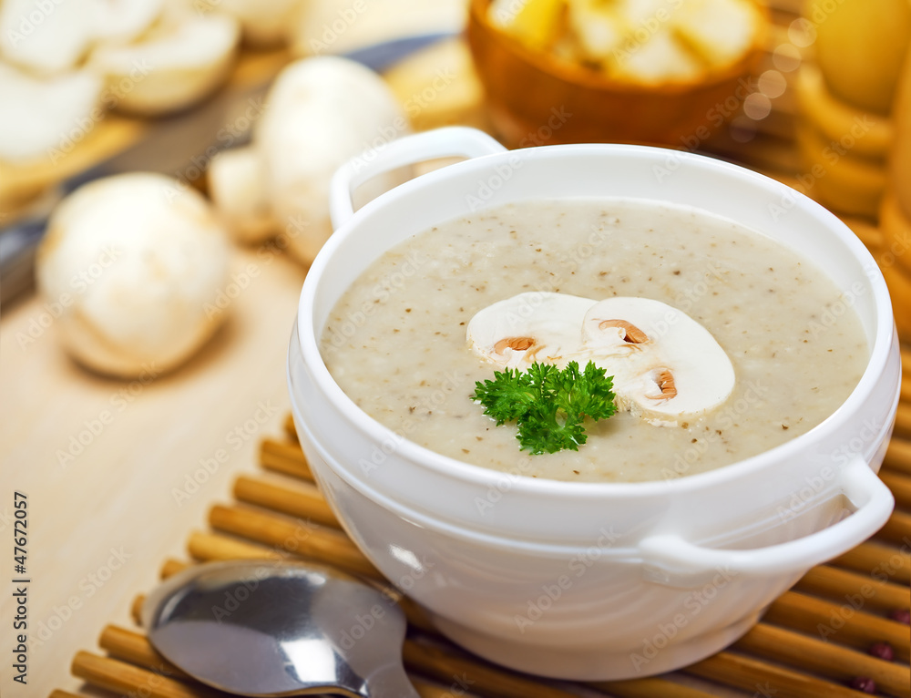 Mushroom cream soup on a table, food Mushroom cream soup on a table, food