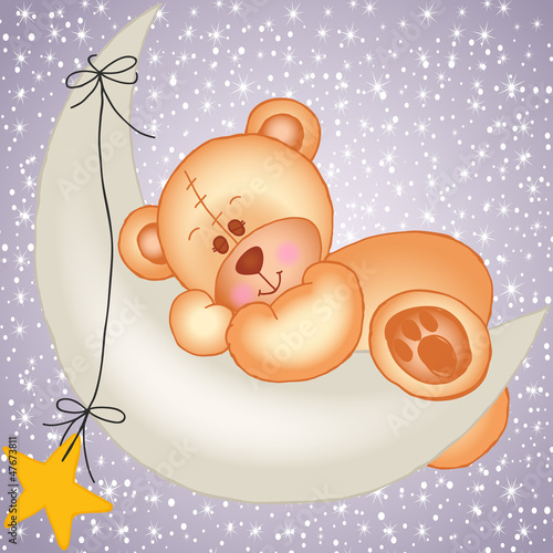 Teddy bear sleeping on a moon