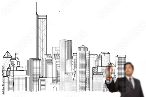 businessman drawing a city