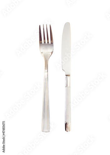 Knife and fork parallel on a white background