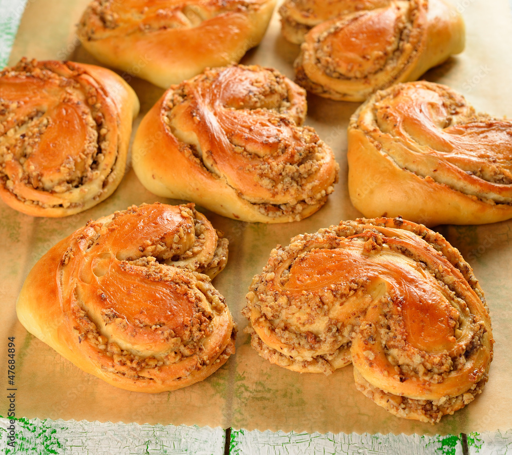 Sweet buns with nuts in the form of heart