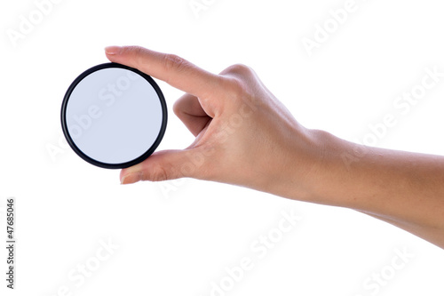 Hand holding polarization filter