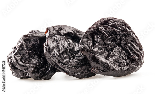 Prunes isolated on white background