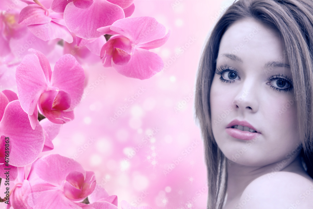 beautiful young woman with pink orchids beautiful young woman with pink orchids