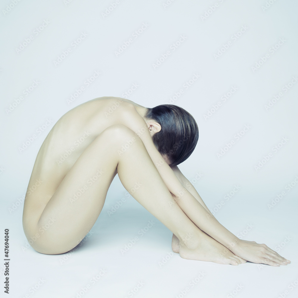 Fototapeta premium Elegant sitting lady