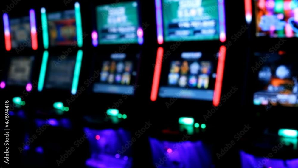 Slot machines videopoker glowing angle view Slot machines videopoker glowing angle view