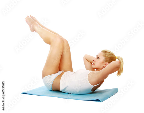 Woman doing strength exercises for abdominal
