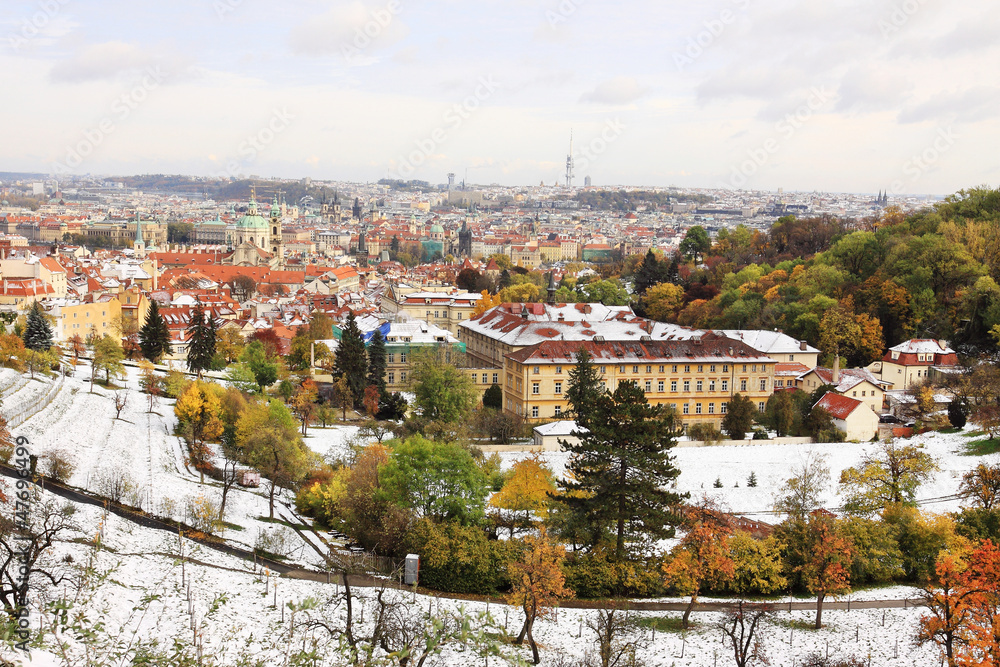 Snowy colorful autumn View on Prague City, Czech Republic