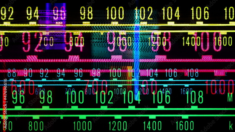 a glowing radio with the marker running through stations a glowing radio with the marker running through stations