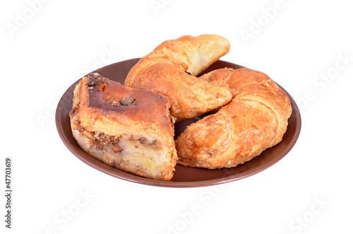 Homemade crescent roll with nut on plate