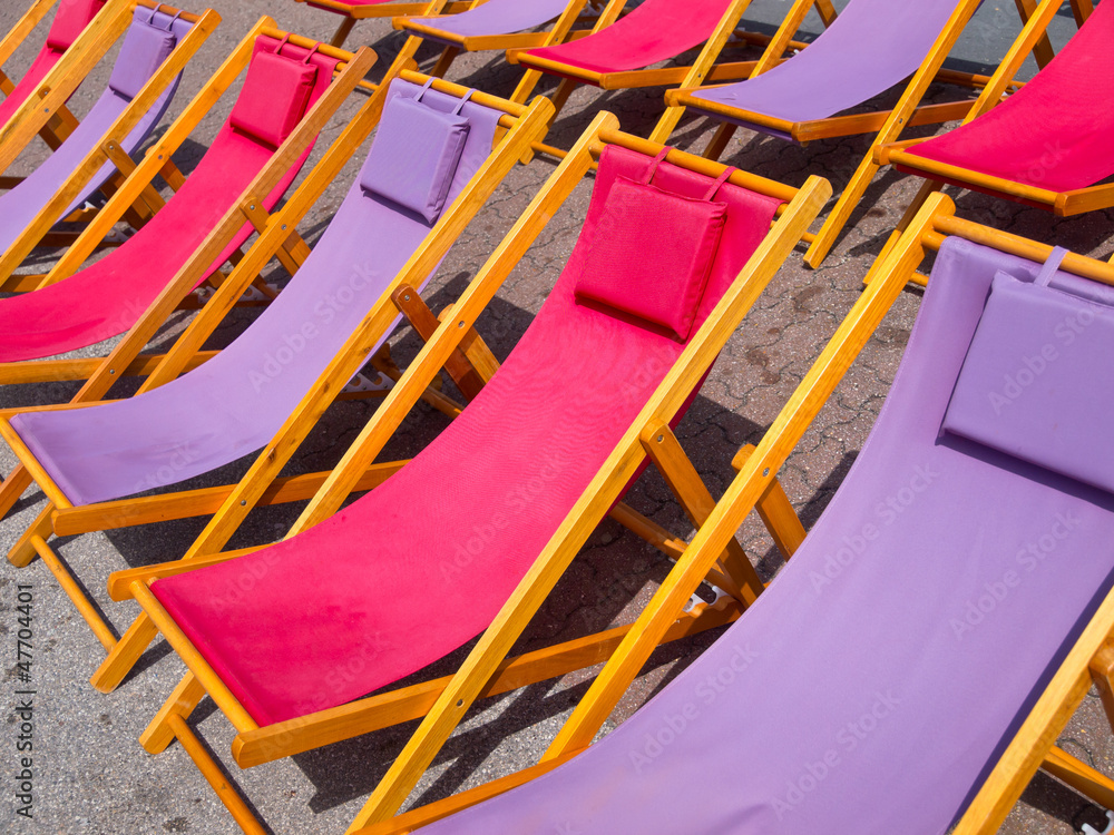 Colorful beach chairs background