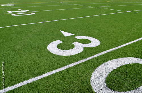An empty high school football field