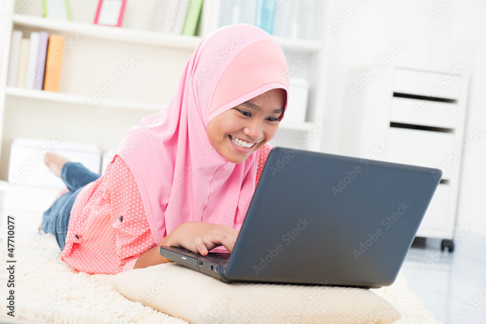 Asian teenager surfing internet Asian teenager surfing internet