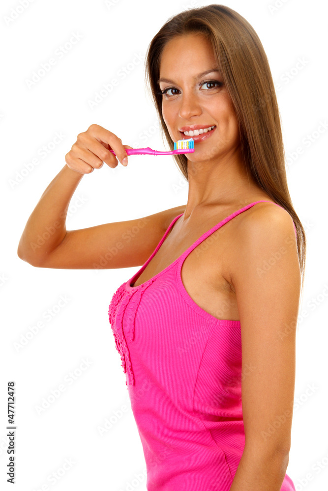 Beautiful young woman with toothbrush isolated on white Beautiful young woman with toothbrush isolated on white