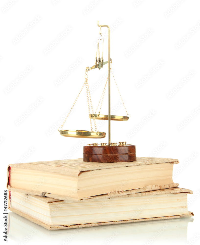 Gold scales of justice and books isolated on white Gold scales of justice and books isolated on white