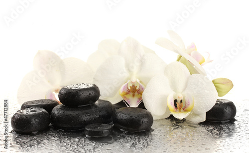 Fototapeta Naklejka Na Ścianę i Meble -  Spa stones and orchid flowers, isolated on white.
