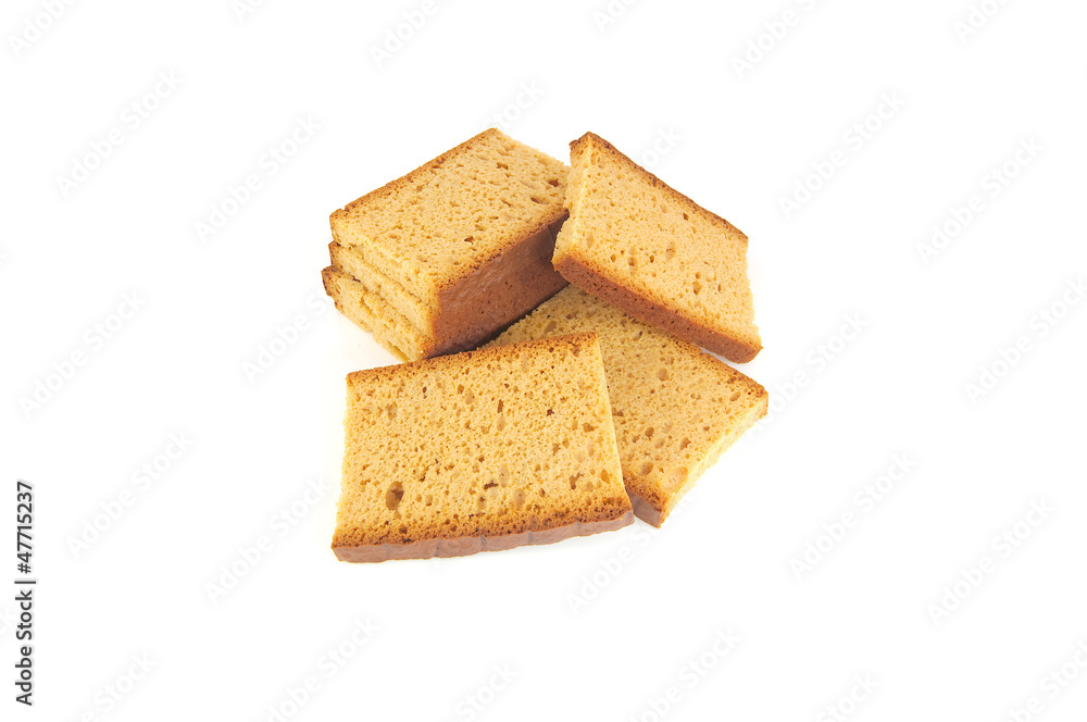 pain d'épice au miel en tranches sur fond blanc pain d'épice au miel en tranches sur fond blanc