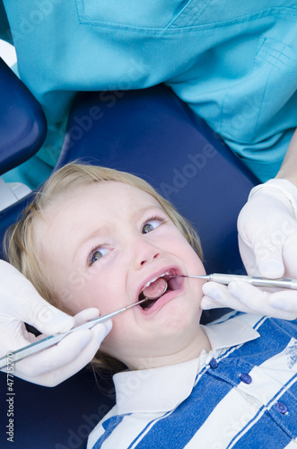 Kid at dentist