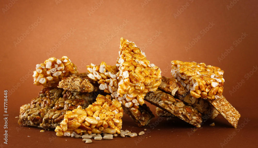 tasty sweets (kozinaki), on brown background tasty sweets (kozinaki), on brown background