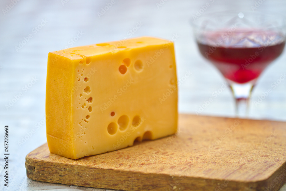 Emental cheese and wine shoot with short DOF Emental cheese and wine shoot with short DOF
