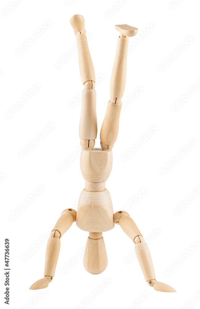 Wooden dummy standing on its head Wooden dummy standing on its head