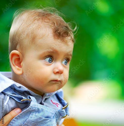 Quadro su tela Baby boy portrait outdoor in spring