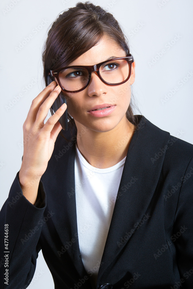 brunette businesswoman talking by cellphone 