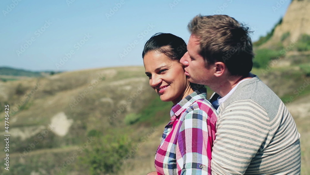 Hugging couple enjoying panoramic view of Tuscany, crane shot Hugging couple enjoying panoramic view of Tuscany, crane shot