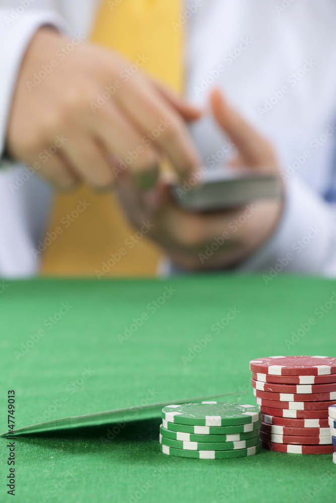 poker player with a yellow tie serving cards poker player with a yellow tie serving cards